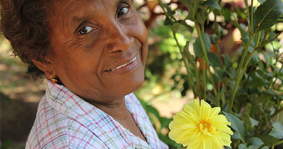 Older Woman and Flower