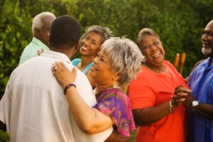 Family members dancing in the backyard